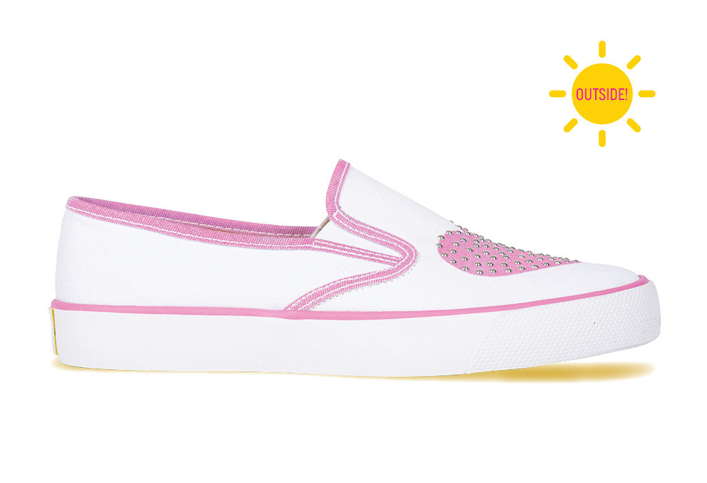 Womens casual slip-on sneaker with a pink heart that changes color in the sun